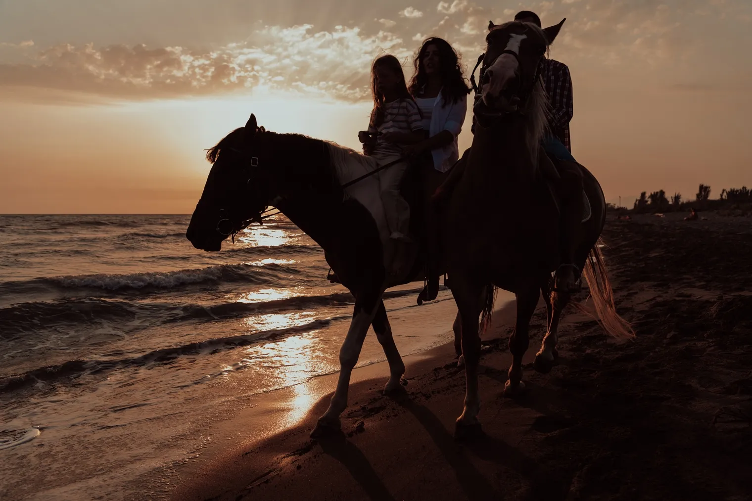 Reiten bei Sonnenuntergang